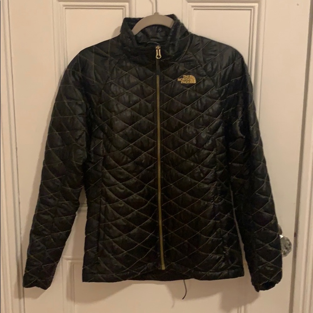 The North Face black and gold thermoball jacket!